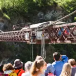 Crowd watching bungy activity on the historic Kawarau suspension bridge near Queenstown.